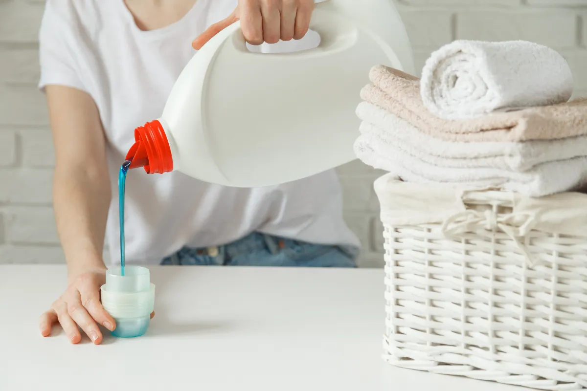 People folding their laundry, Allergy-safe cleaning at Vogue Cleaners